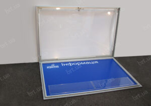 Відкидні дверцята з оргскла в алюмінієвій рамі